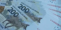 Apostadores conferem os resultados do sorteio da Lotomania realizado em 28 de julho de 2025, com prêmio principal acumulado e surpresa no resultado de 0 acertos.